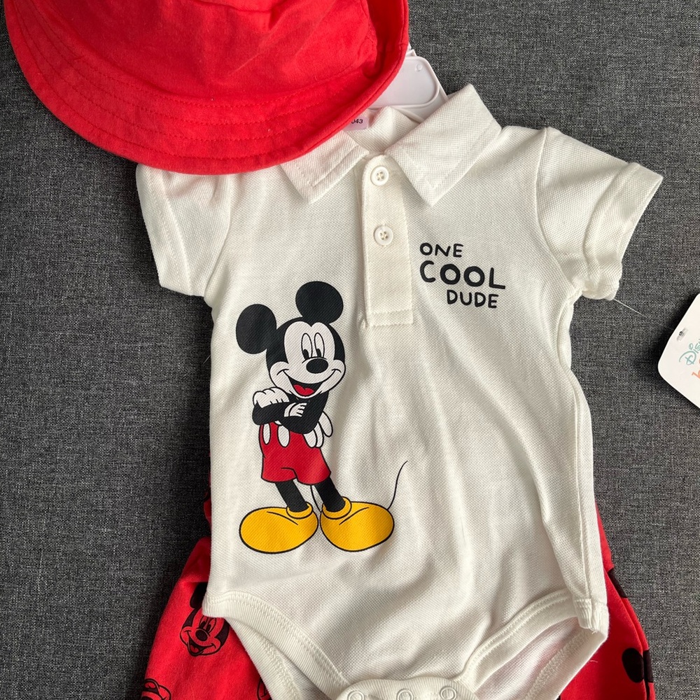 Disney Mickey Mouse onesie with coordinating shorts and hat.